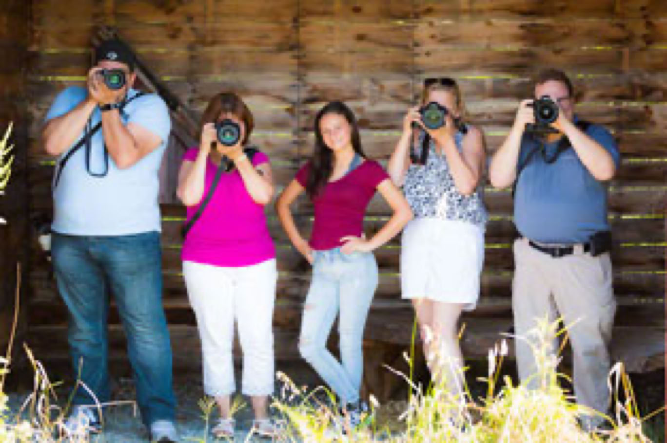a photo of a barn with an antique truck
